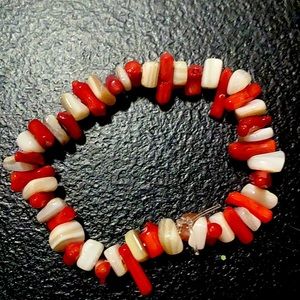 Kids bracelet not worn color is white and red